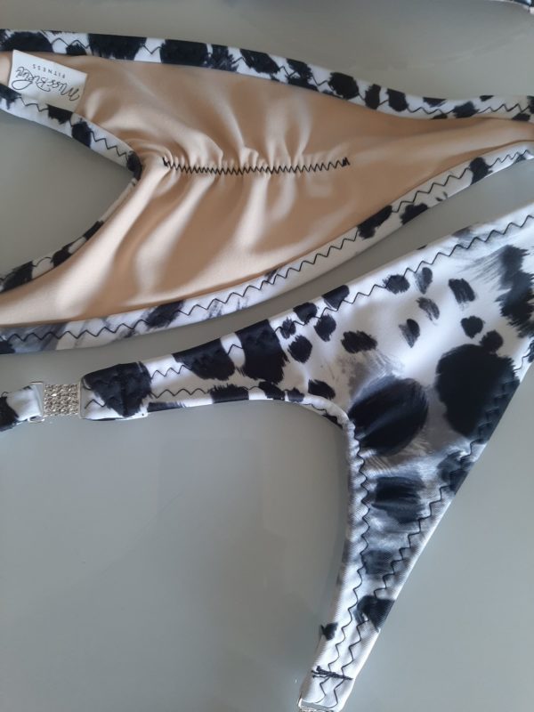 snow leopard print competition posing bikinis